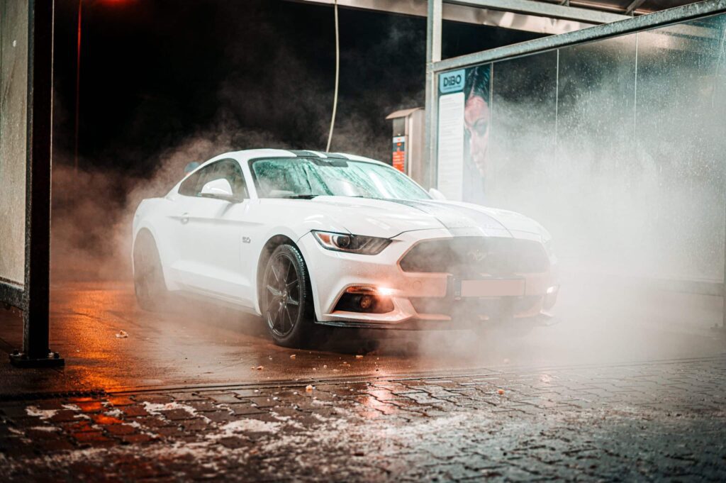 white Ford Mustang coupe