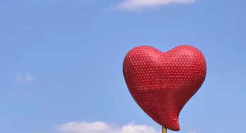red heart balloon under blue sky during daytime