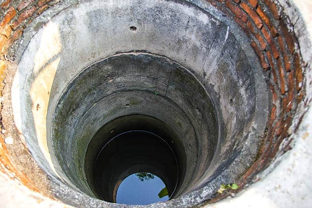 Old brick and concrete deep well