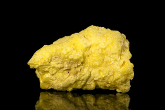 Rocks and Minerals - Sulfur isolated on black background.